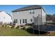 Spacious backyard with patio, fire pit, and trampoline at 1134 Aster Way, Burlington, NC 27215
