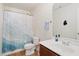 Clean bathroom with shower/tub combo and wood floor at 1134 Aster Way, Burlington, NC 27215