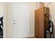 Home entryway with coat closet and hardwood floors at 1134 Aster Way, Burlington, NC 27215