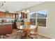 Kitchen with round table and chairs, wood cabinets, and ample counter space at 1134 Aster Way, Burlington, NC 27215