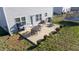 Concrete patio with table and chairs, near the house at 1134 Aster Way, Burlington, NC 27215