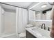 Modern bathroom with marble vanity, updated fixtures, and a shower/tub combo at 1535 Caraleigh Mills Ct # 221, Raleigh, NC 27603