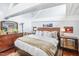 Main bedroom with a king-size bed and wood dresser at 1535 Caraleigh Mills Ct # 221, Raleigh, NC 27603