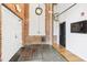 Building entryway with exposed brick and signage for apartments and storage at 1535 Caraleigh Mills Ct # 221, Raleigh, NC 27603