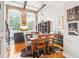 Bright dining area with hardwood floors and a large table at 1535 Caraleigh Mills Ct # 221, Raleigh, NC 27603
