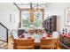 Dining room featuring a wooden table and hardwood floors at 1535 Caraleigh Mills Ct # 221, Raleigh, NC 27603