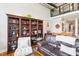 Open living space with comfortable seating and built-in bookshelves at 1535 Caraleigh Mills Ct # 221, Raleigh, NC 27603