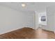 Bedroom with hardwood floors, double closet, and window seat at 1621 Sutton Dr, Raleigh, NC 27605