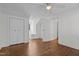 Bright bedroom with hardwood floors, ceiling fan, and built-in window seat at 1621 Sutton Dr, Raleigh, NC 27605