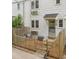 Cozy private patio with brick flooring, a fence, and comfortable outdoor furniture at 1621 Sutton Dr, Raleigh, NC 27605