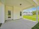 Covered patio offers outdoor living space and backyard views at 18 Hewitt Woods Dr, Clayton, NC 27527