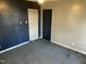 A bedroom with a closet, light fixture, and neutral walls at 2324 Lonnie Cir, Hillsborough, NC 27278