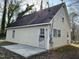 Rear view of home including patio, exterior siding, and windows at 2324 Lonnie Cir, Hillsborough, NC 27278
