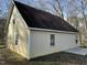 Side view of the home displaying siding, roof, and windows at 2324 Lonnie Cir, Hillsborough, NC 27278