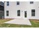 Backyard view showcasing a patio and a neatly maintained lawn, perfect for outdoor enjoyment at 257 North Maple Walk Dr # 218, Garner, NC 27529