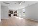 Open floor plan with kitchen that flows into the dining room at 257 North Maple Walk Dr # 218, Garner, NC 27529