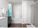 Bathroom with tub, shower, and modern vanity at 326 Armistead Ct, Burlington, NC 27217
