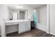Main bathroom with a large vanity and soaking tub at 326 Armistead Ct, Burlington, NC 27217