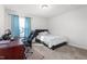 Cozy bedroom with a built-in desk and window at 326 Armistead Ct, Burlington, NC 27217