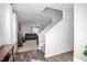 Bright entryway with hardwood floors and staircase leading upstairs at 326 Armistead Ct, Burlington, NC 27217