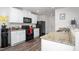 Modern kitchen with granite countertops and stainless steel appliances at 326 Armistead Ct, Burlington, NC 27217
