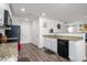 Modern kitchen featuring granite countertops and black appliances at 326 Armistead Ct, Burlington, NC 27217