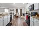 Open concept kitchen with granite counters and stainless steel appliances at 326 Armistead Ct, Burlington, NC 27217