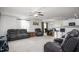 Spacious living room with leather furniture and a ceiling fan at 326 Armistead Ct, Burlington, NC 27217
