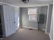 Simple bedroom with carpeted floor and window at 3612 Mt Zion Church Rd, Mebane, NC 27302