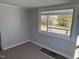 Bedroom with large window and view of backyard at 3612 Mt Zion Church Rd, Mebane, NC 27302