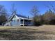 Newly renovated blue home with detached garage and large yard at 3612 Mt Zion Church Rd, Mebane, NC 27302