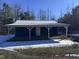 Detached blue garage with carport at 3612 Mt Zion Church Rd, Mebane, NC 27302