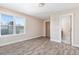 Bright bedroom featuring hardwood floors and a view at 402 W Clay St, Mebane, NC 27302