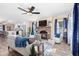 Open concept living area with kitchen views and a cozy fireplace at 402 W Clay St, Mebane, NC 27302