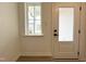 Inviting entryway with natural light and a view through the window next to the front door at 4321 Darius Ln # 23, Fuquay Varina, NC 27526