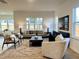 Spacious living room with neutral furniture, bright windows, and natural light at 4321 Darius Ln # 23, Fuquay Varina, NC 27526