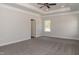 Large bedroom with carpet, ceiling fan and access to bathroom at 572 Glenkirk Pl, Garner, NC 27529