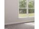 Bedroom with large window offering a view of nature at 572 Glenkirk Pl, Garner, NC 27529