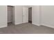 Bedroom with carpet, an open door, and a closet at 572 Glenkirk Pl, Garner, NC 27529