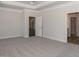 Primary bedroom with access to bathroom and kitchen at 572 Glenkirk Pl, Garner, NC 27529