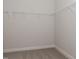 Walk-in closet with wire shelving at 572 Glenkirk Pl, Garner, NC 27529