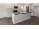 Kitchen with granite countertops, white cabinets, and stainless steel appliances at 572 Glenkirk Pl, Garner, NC 27529