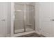 Large walk-in shower with tiled walls and seat at 572 Glenkirk Pl, Garner, NC 27529