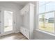 Mudroom with bench seating, coat hooks, and built-in storage at 704 Georgia'S Landing Pkwy # 15, Raleigh, NC 27603