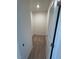Walk-in closet featuring carpet flooring and a door at 93 Ausban Ridge Ln # 033, Four Oaks, NC 27524