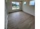 Dining area with wood floors and lots of windows for natural light and pretty views at 93 Ausban Ridge Ln # 033, Four Oaks, NC 27524