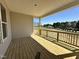 A spacious wooden porch perfect for entertaining or enjoying the scenic outdoor views at 93 Ausban Ridge Ln # 033, Four Oaks, NC 27524
