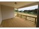 Relaxing porch view with wood flooring and country view at 93 Ausban Ridge Ln # 033, Four Oaks, NC 27524