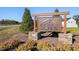 Browning Stables community sign with stone posts and landscaping at 102 Belmont Stakes Ln, Wendell, NC 27591