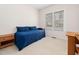 Bedroom with a daybed and built-in shelving unit at 10509 Cokesbury Ln, Raleigh, NC 27614